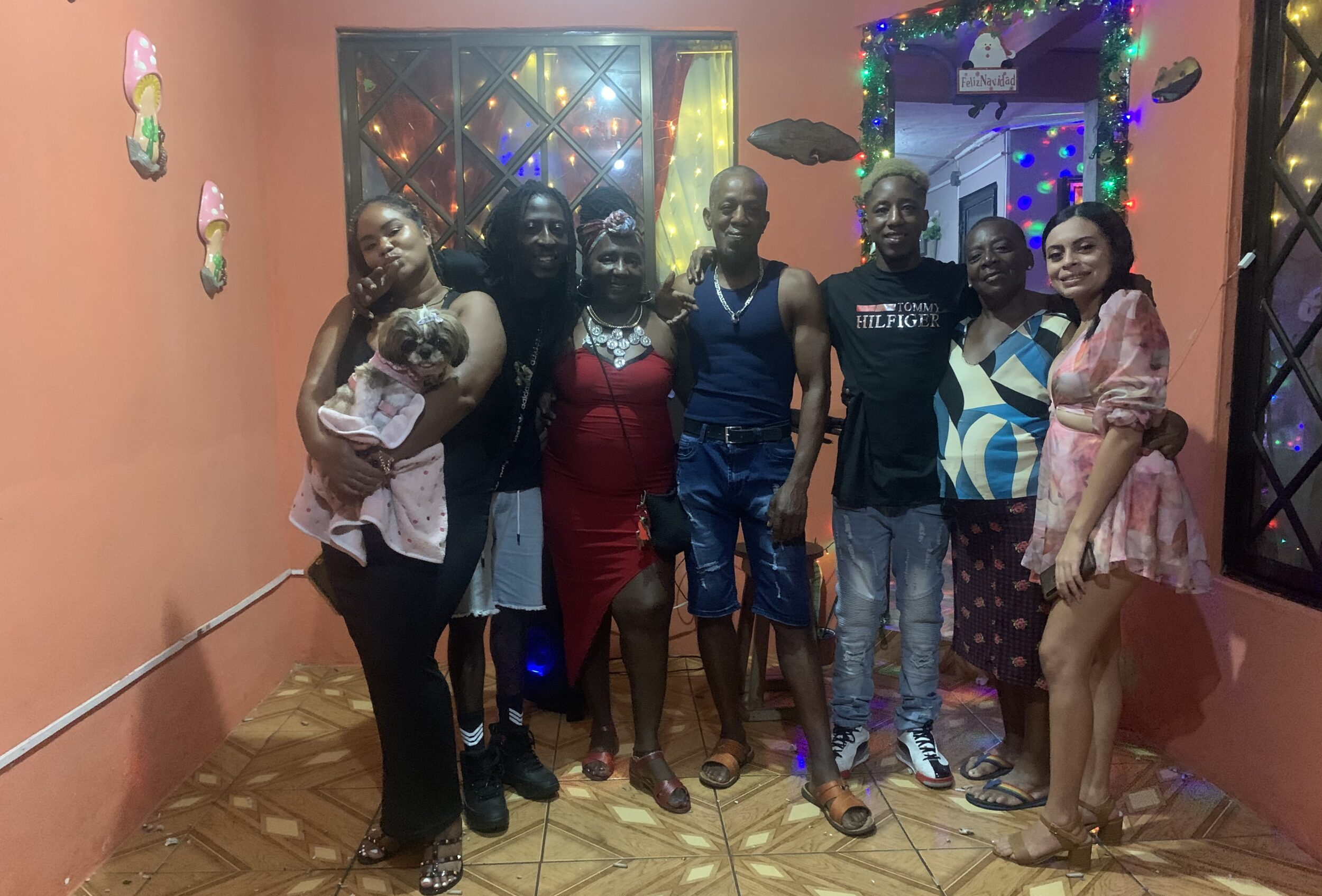 Costa Rican family celebrating Noche Buena on Christmas Eve.